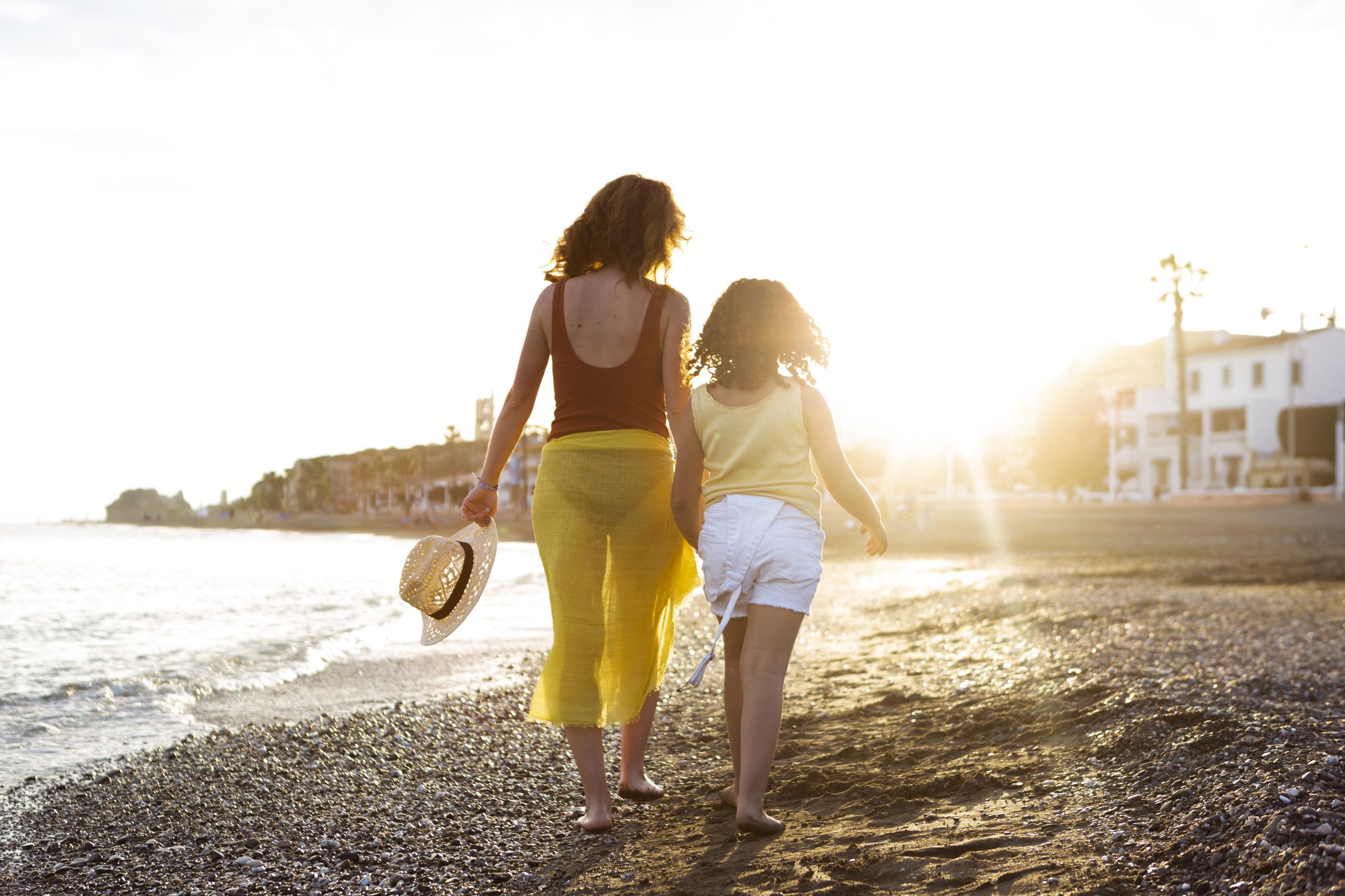 full-shot-woman-girl-beach